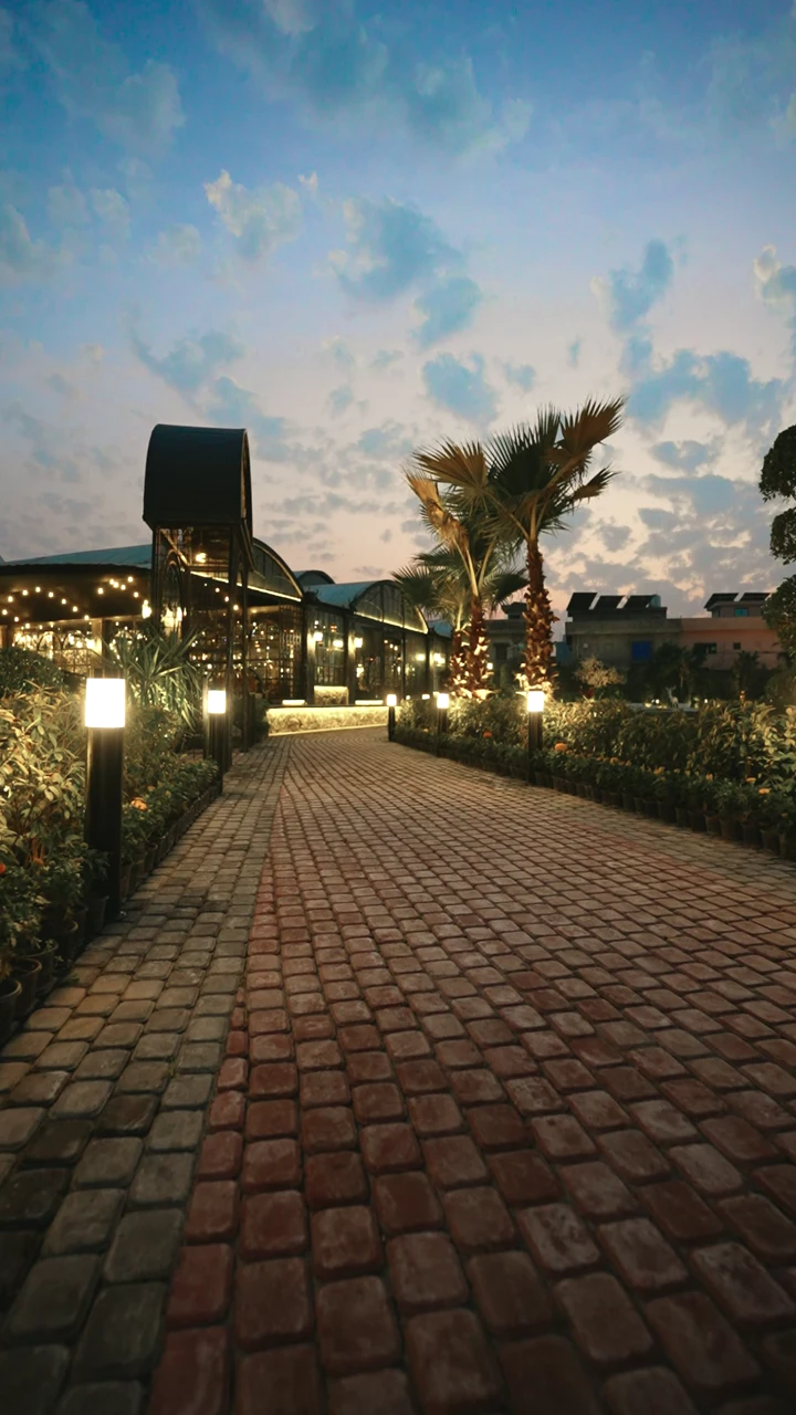 The garden path beneath an evening sky